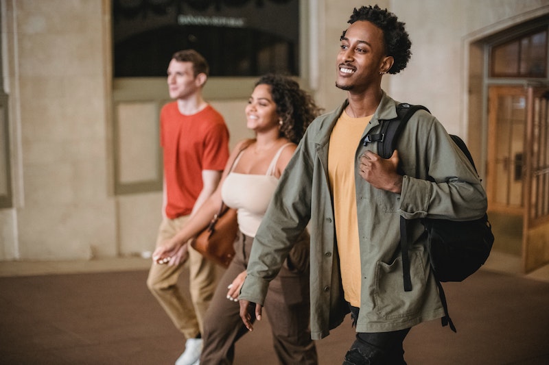 multiethnic students walking to class